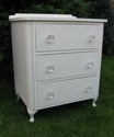 A classic-shaped bedside cabinet with glass knobs - SOLD